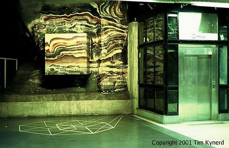 Teknis, artwork on wall and floor, north end