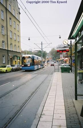 Street in Gr&ouml;ndal, car moves closer