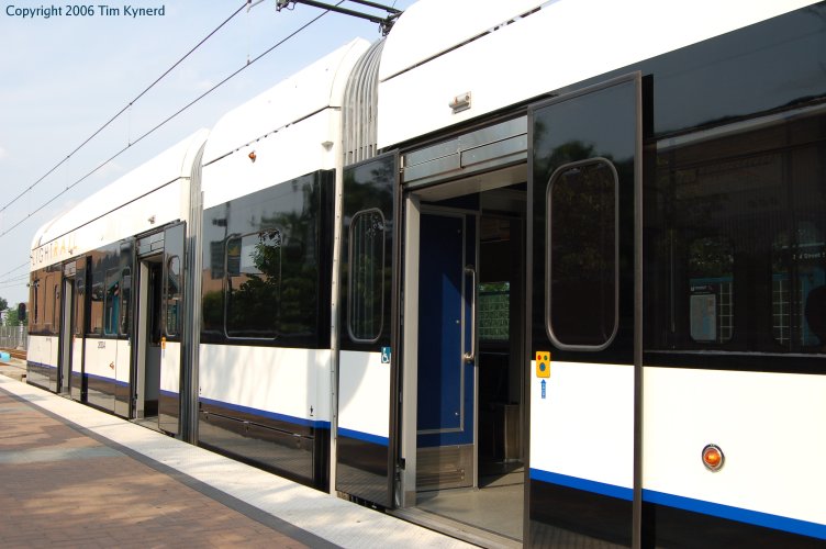 Side of tram with doors open, 22nd Street